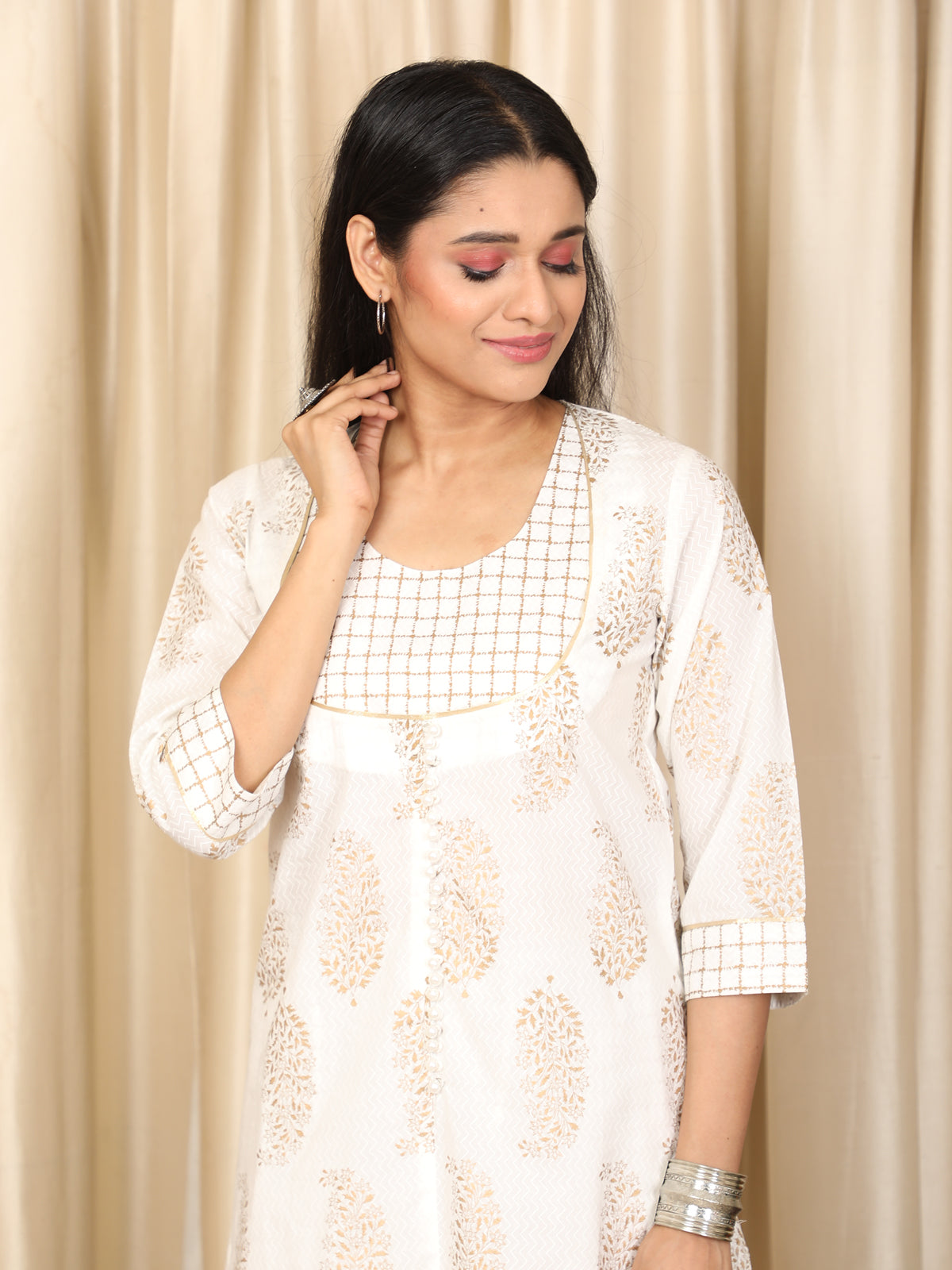Regal Gold on White Party Wear A-line Kurti UCKL22015